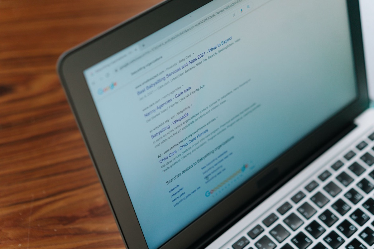 Close-up of a Google search engine interface on a digital monitor